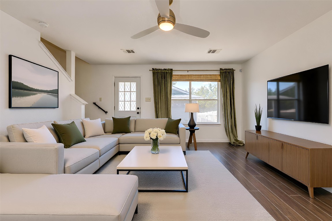 356 Wetzel Kyle, TX 78640 - Photo 7 of 24 a living room with furniture and a flat screen tv