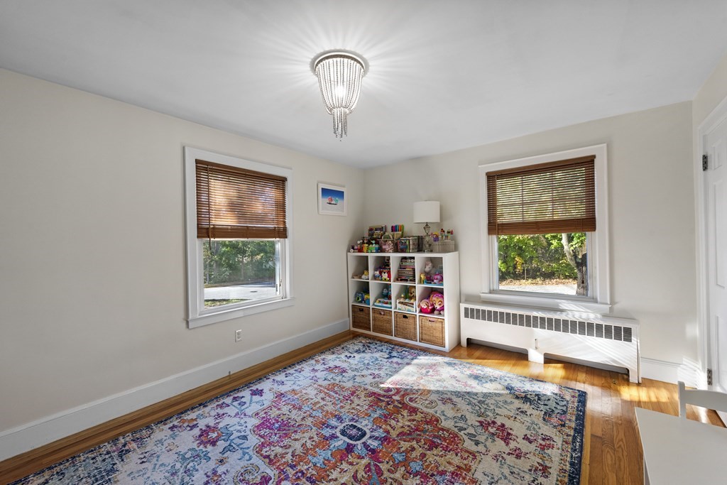 32 Concord Road Chelmsford, MA 01824 - Photo 17 of 27 a bedroom with furniture and a window