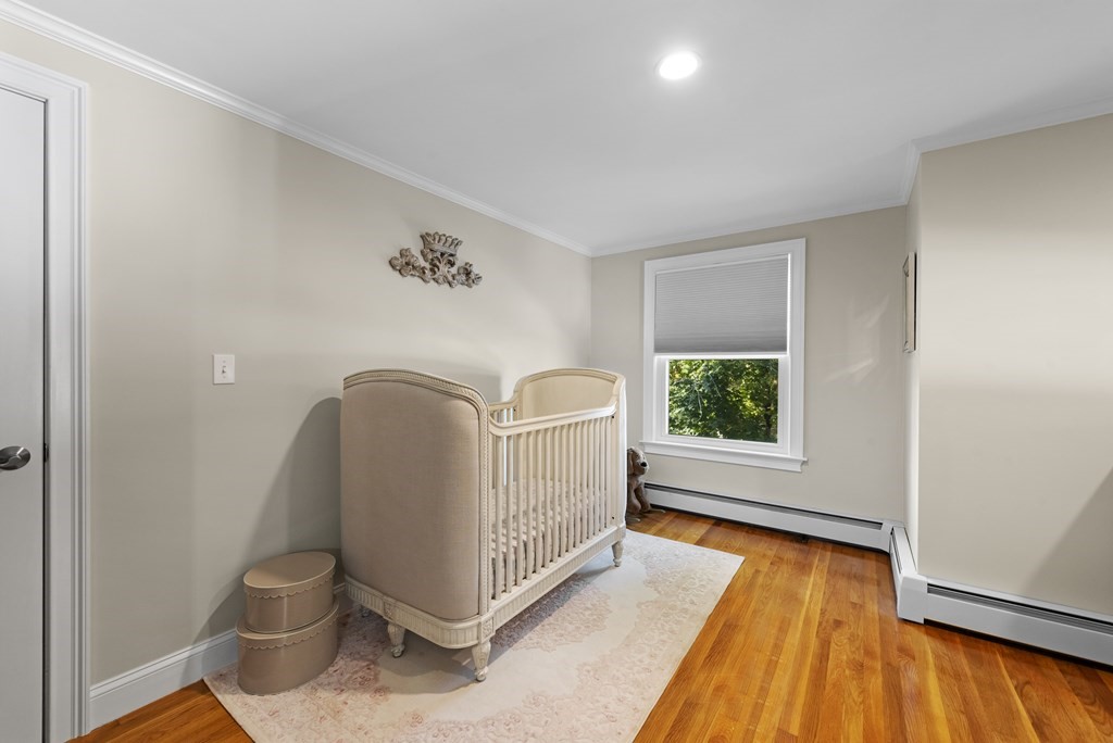 32 Concord Road Chelmsford, MA 01824 - Photo 21 of 27 a view of a hallway with entryway window and wooden floor
