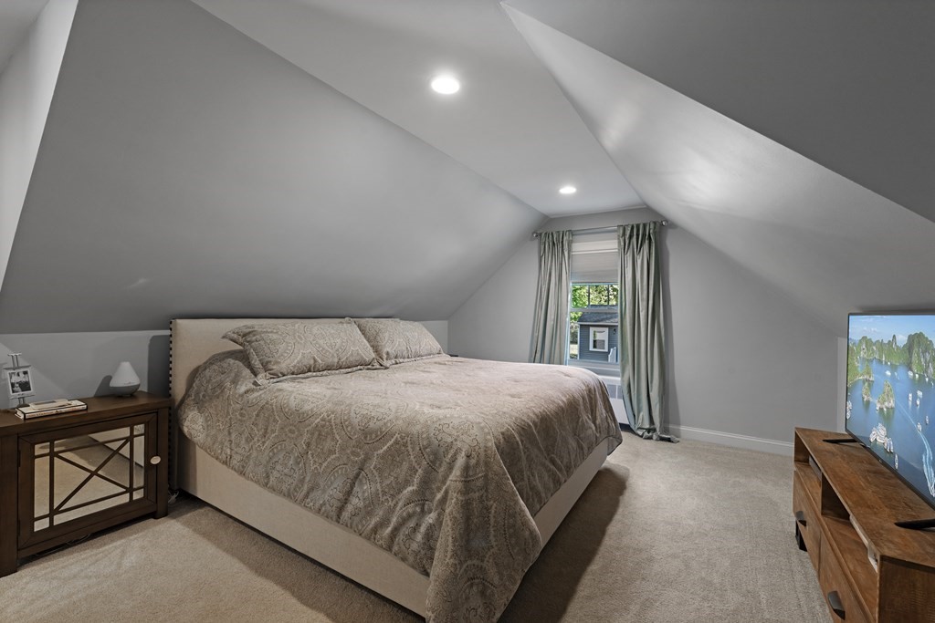 32 Concord Road Chelmsford, MA 01824 - Photo 27 of 27 a bedroom with a bed and a window