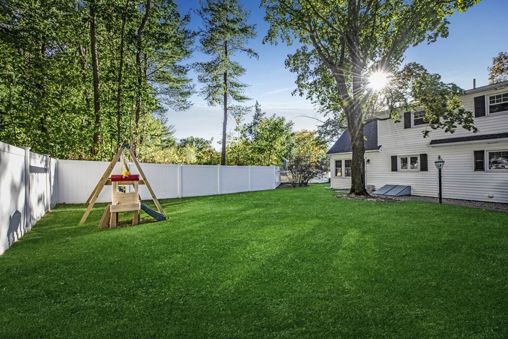 32 Concord Road Chelmsford, MA 01824 - Photo 7 of 27 a view of backyard with swimming pool