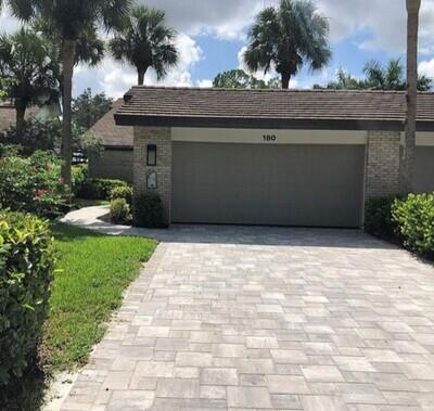 180 Cypress View Drive, Unit C35 Naples, FL 34113 - Photo 1 of 1 a backyard of a house with lots of green space