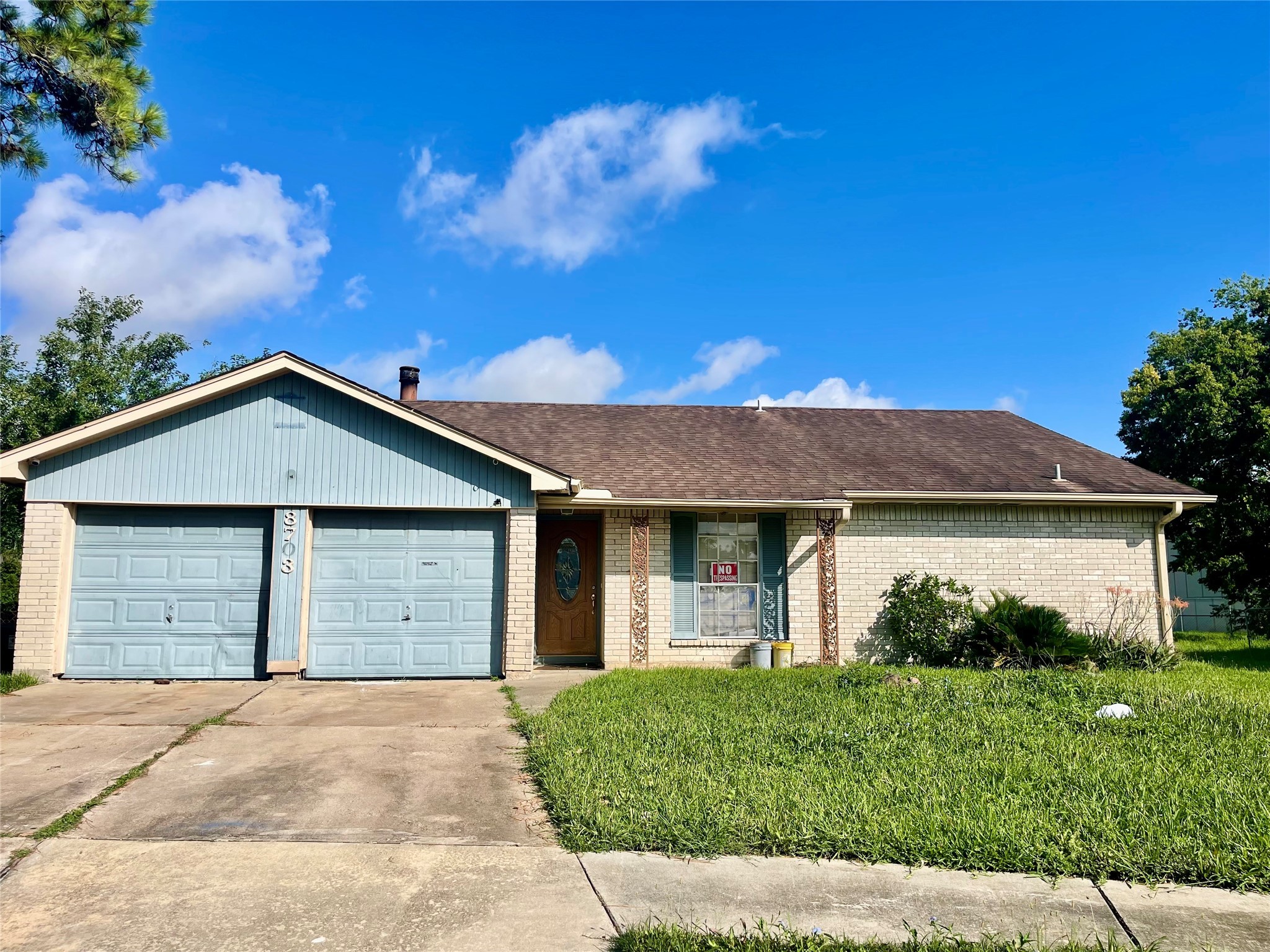 8703 Ashwyne Lane La Porte, TX 77571 - Photo 1 of 7 a view of a house with a yard plants and a garage