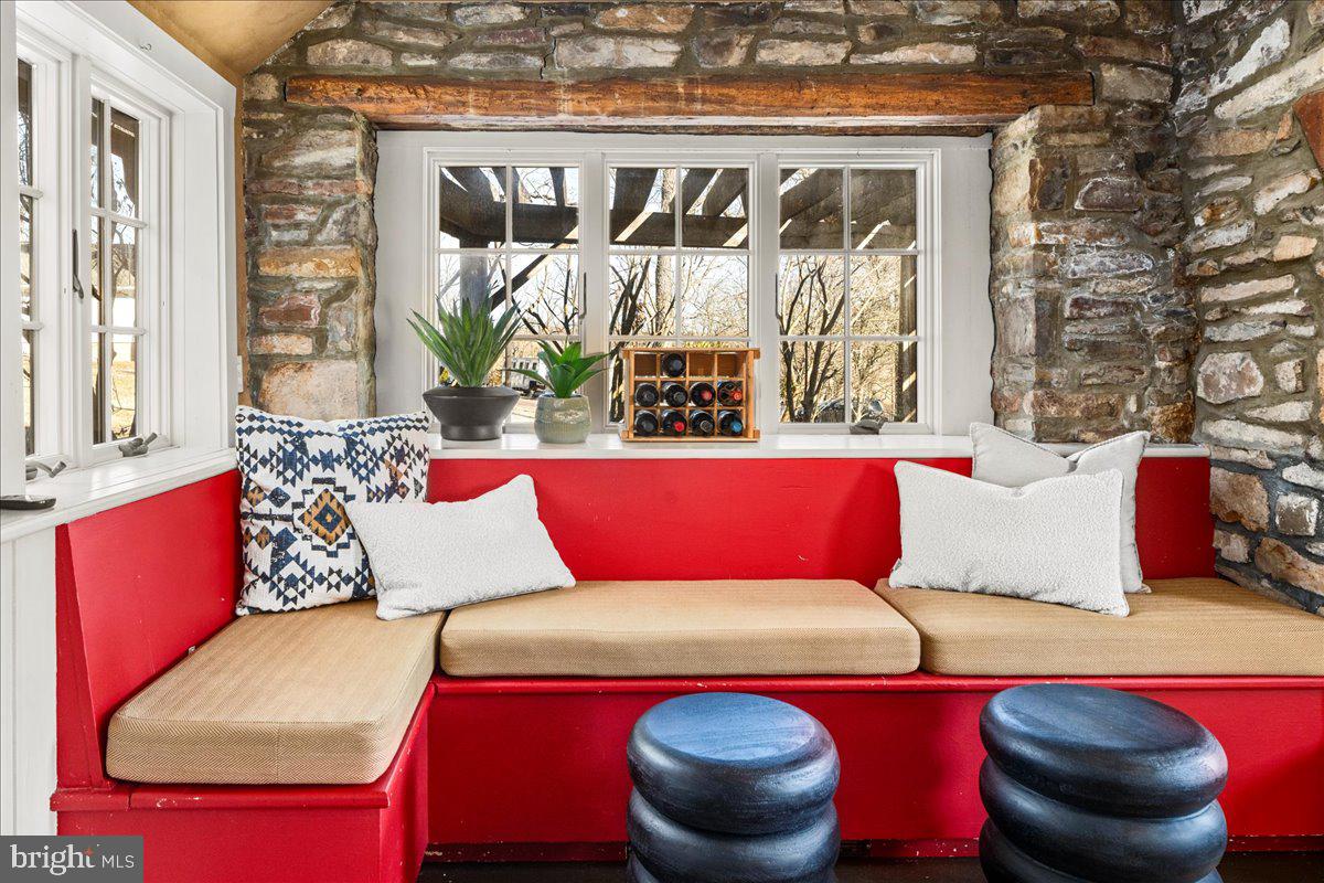 1515 Sugar Bottom Road Furlong, PA 18925 - Photo 24 of 52 a living room with furniture and a large window