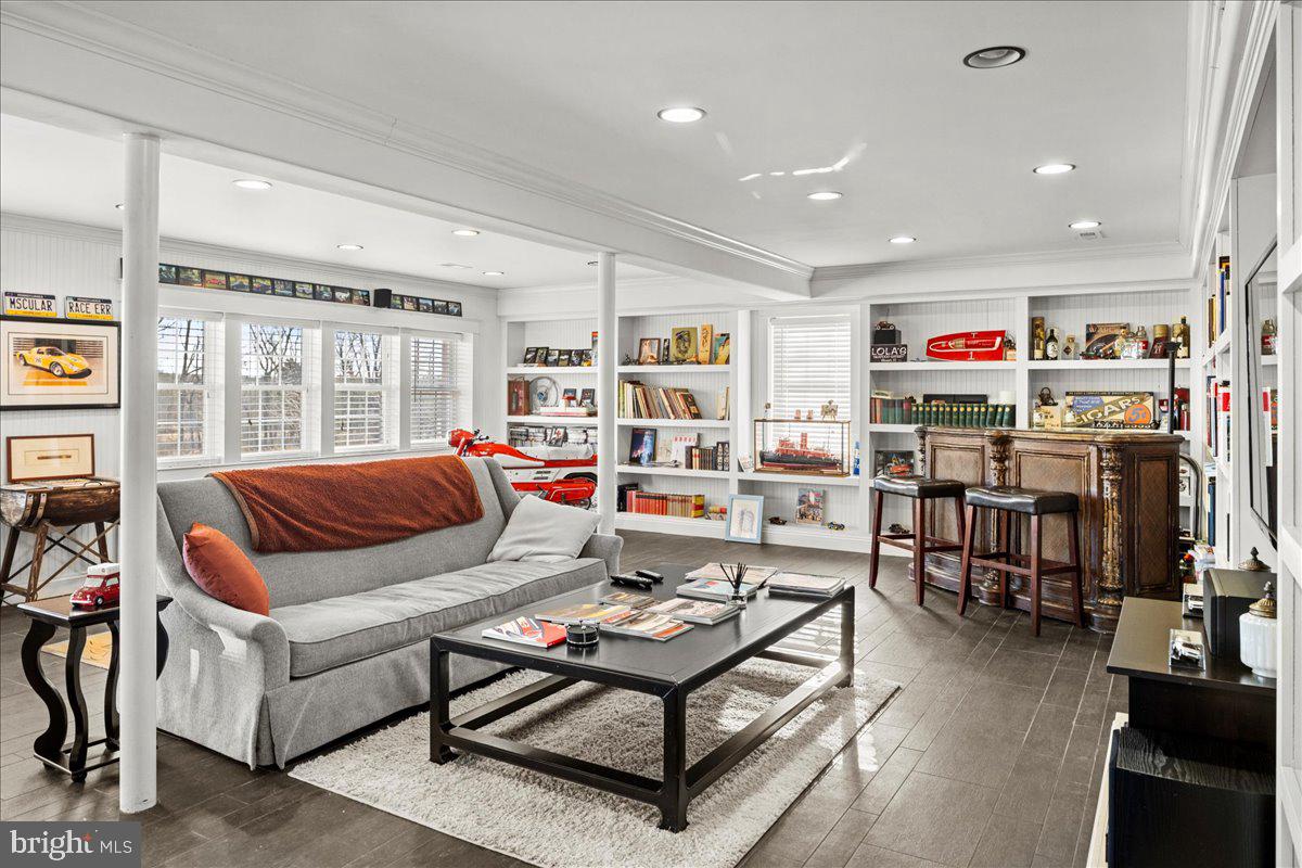 1515 Sugar Bottom Road Furlong, PA 18925 - Photo 43 of 52 a living room with furniture and a flat screen tv