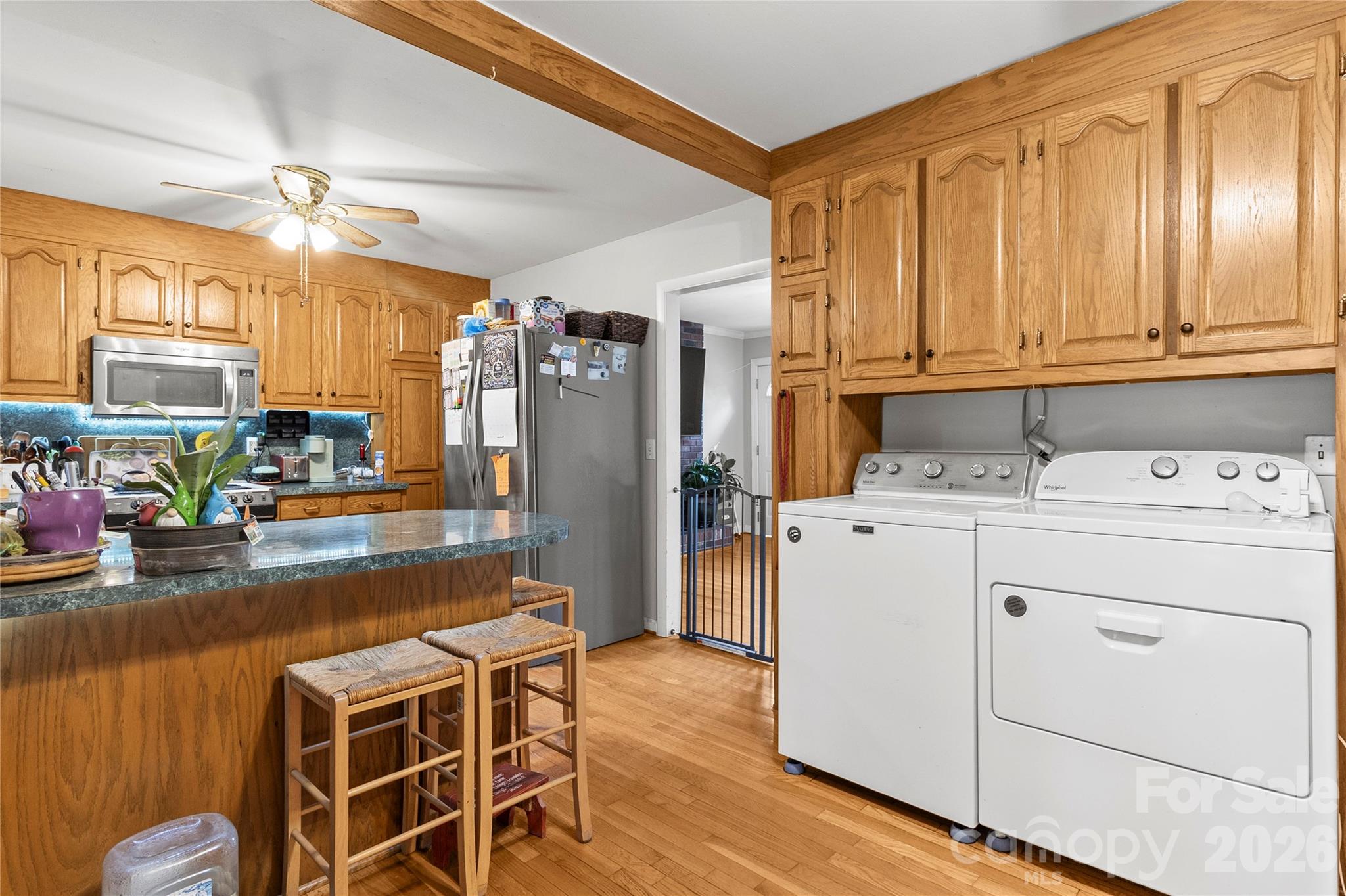 325 Swanson Road Lenoir, NC 28645 - Photo 14 of 35 a kitchen with refrigerator cabinets and window