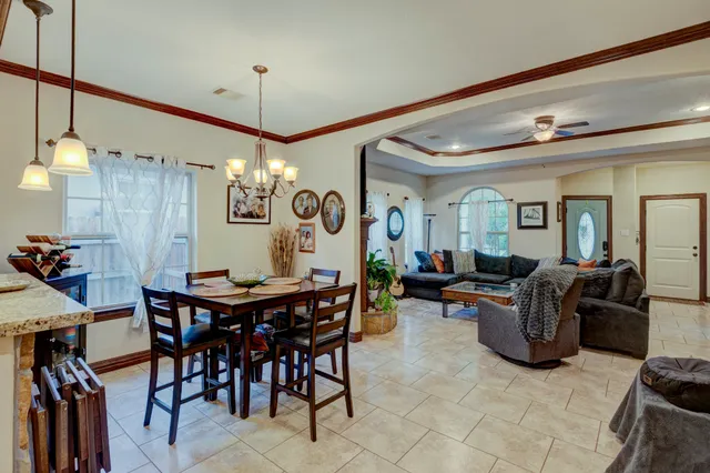 a view of a dining room with furniture