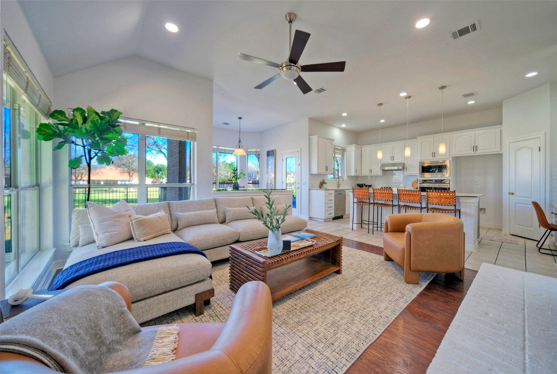 10833 Olympia Fields Loop Austin, TX 78747 - Photo 11 of 38 a living room with furniture and a large window