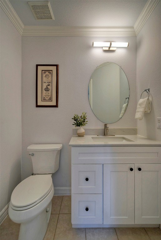 10833 Olympia Fields Loop Austin, TX 78747 - Photo 17 of 38 a bathroom with a toilet a sink and mirror