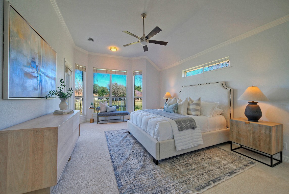 10833 Olympia Fields Loop Austin, TX 78747 - Photo 18 of 38 a bedroom with bed and window