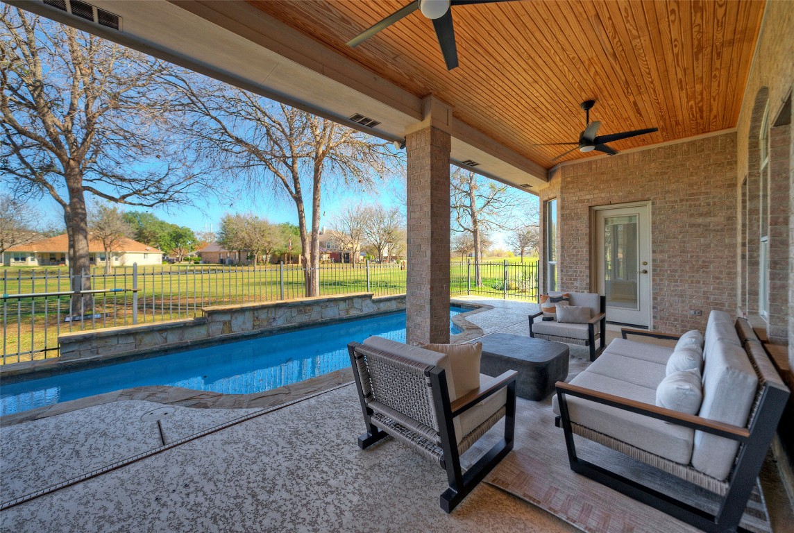 10833 Olympia Fields Loop Austin, TX 78747 - Photo 27 of 38 a building outdoor space with patio furniture