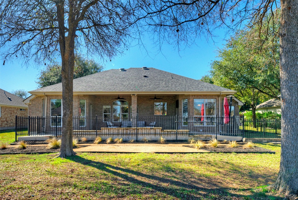 10833 Olympia Fields Loop Austin, TX 78747 - Photo 31 of 38 a view of a swimming pool with a patio
