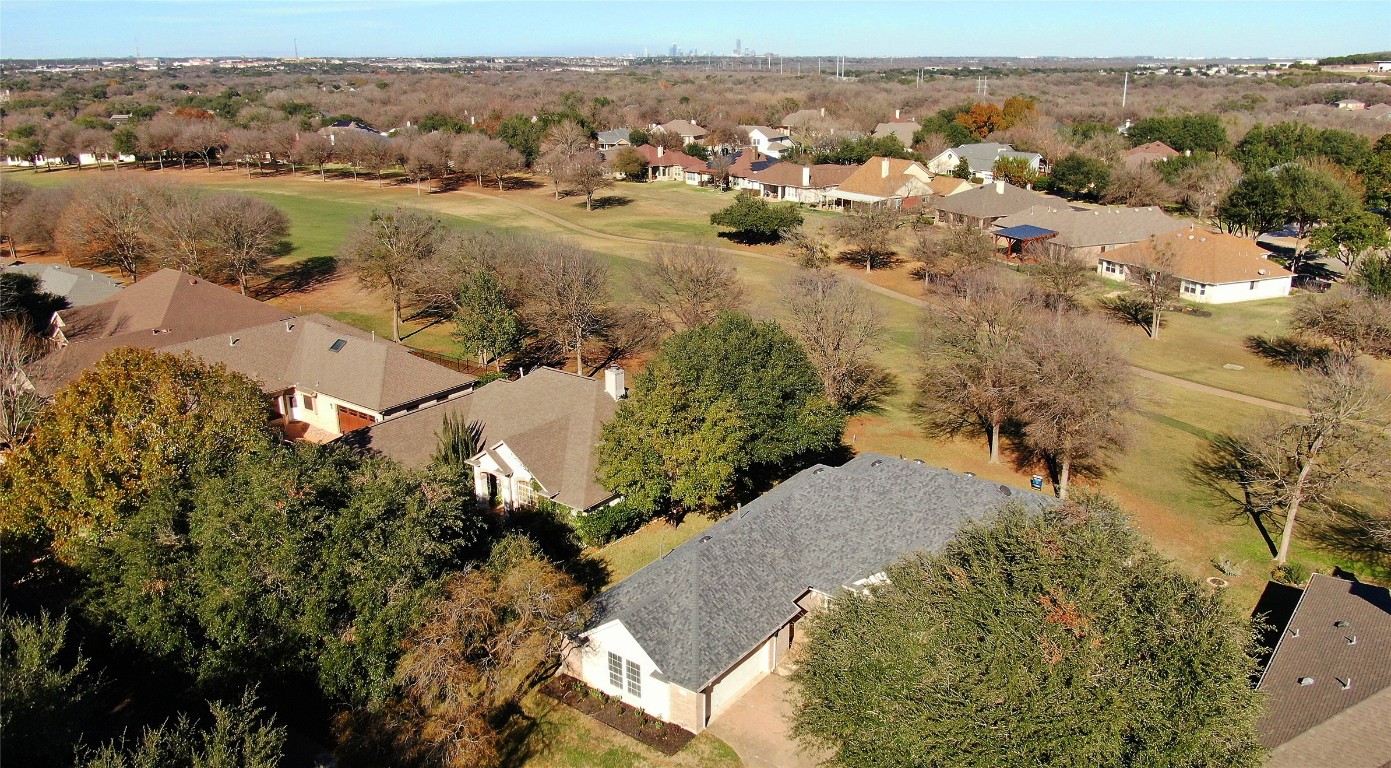 10833 Olympia Fields Loop Austin, TX 78747 - Photo 37 of 38 an aerial view of lake residential house and space with trees all around