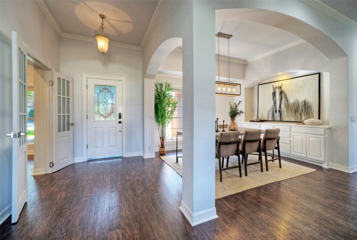 10833 Olympia Fields Loop Austin, TX 78747 - Photo 5 of 38 a view of a livingroom with furniture and hardwood floor