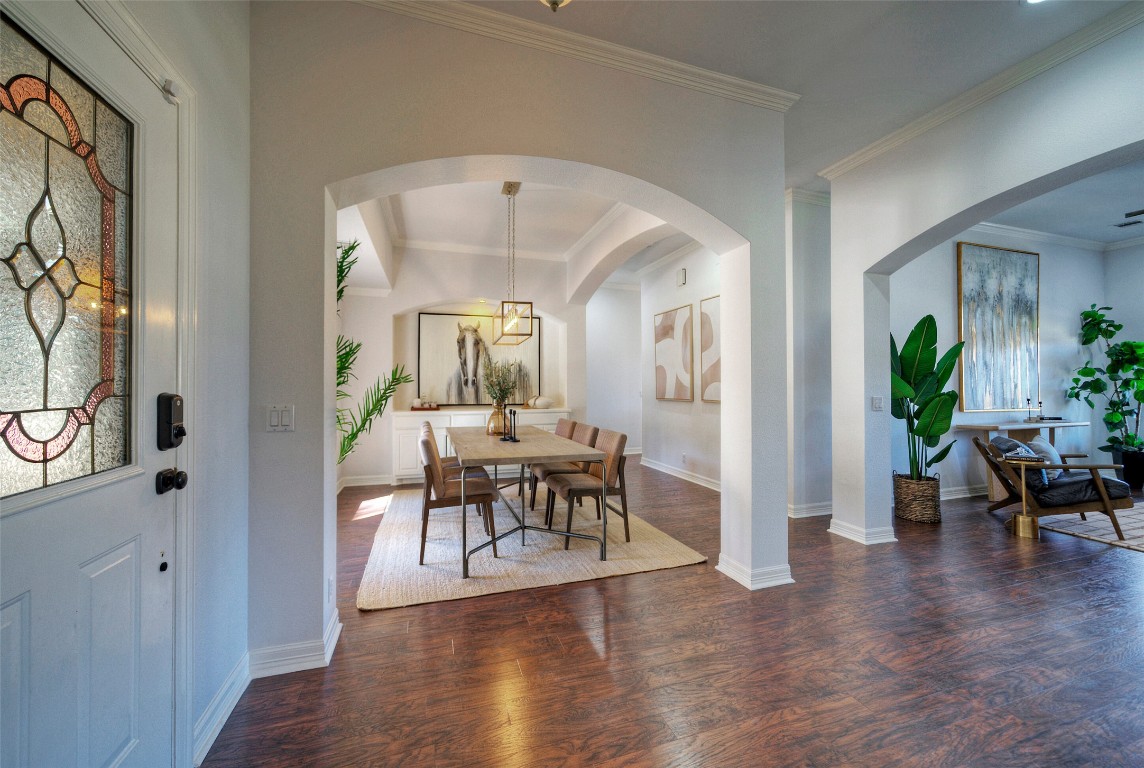 10833 Olympia Fields Loop Austin, TX 78747 - Photo 6 of 38 a view of a dining room with furniture window and wooden floor