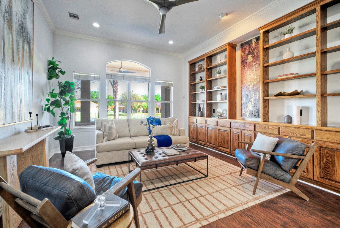 10833 Olympia Fields Loop Austin, TX 78747 - Photo 9 of 38 a living room with furniture and a large window