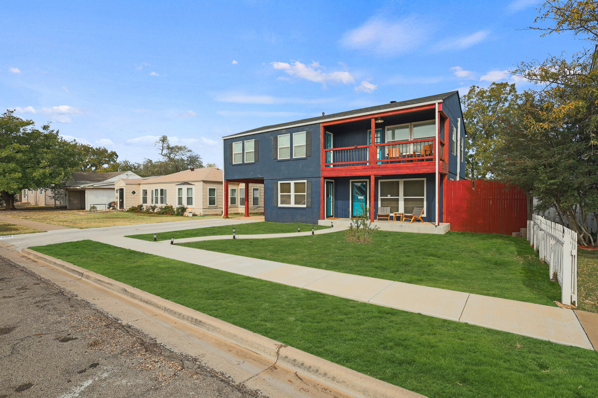 1904 28th Street Lubbock, TX 79411 - Photo 13 of 59 a front view of a house with a yard