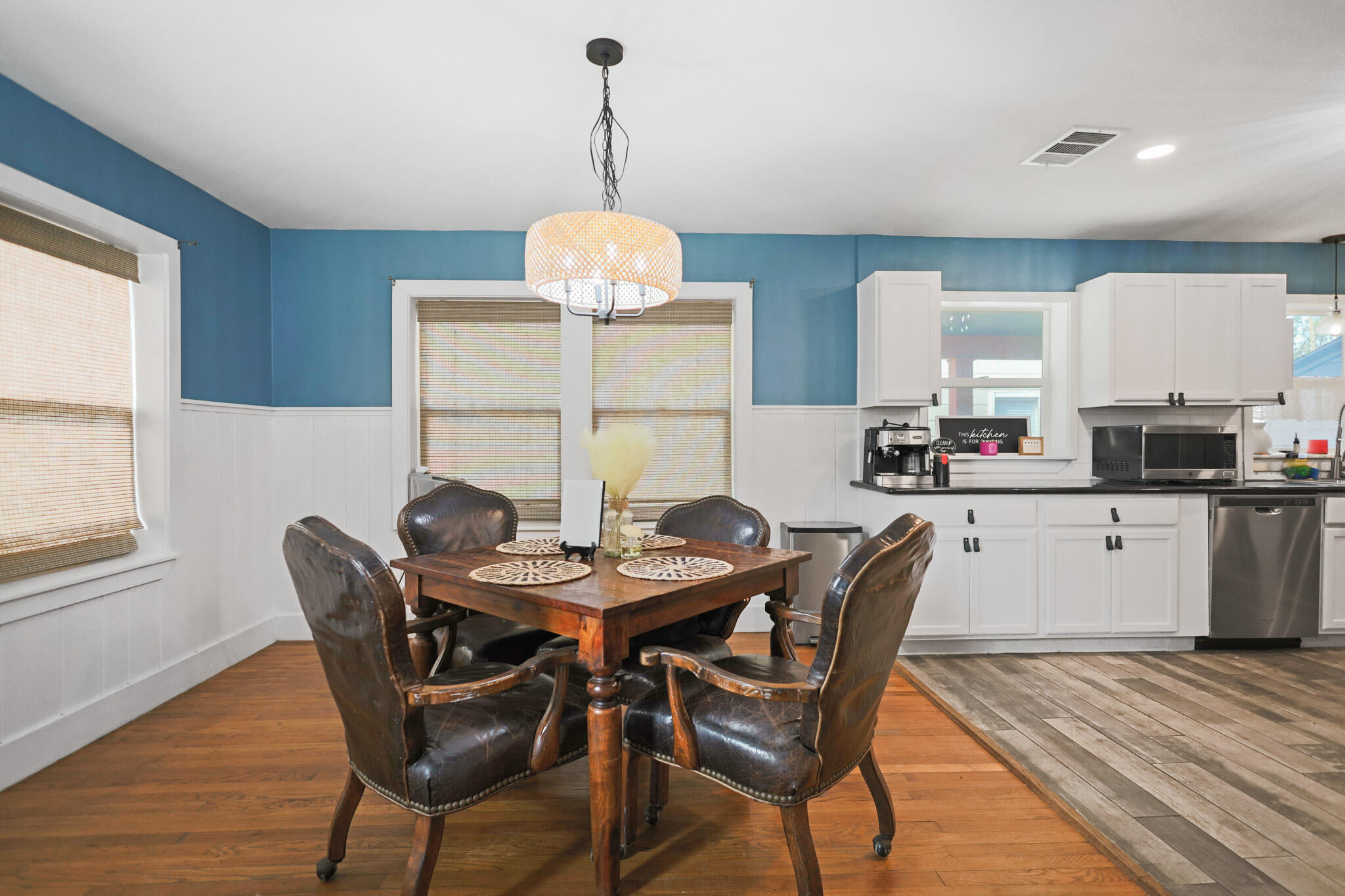 1904 28th Street Lubbock, TX 79411 - Photo 23 of 59 a view of a dining room with furniture window and wooden floor