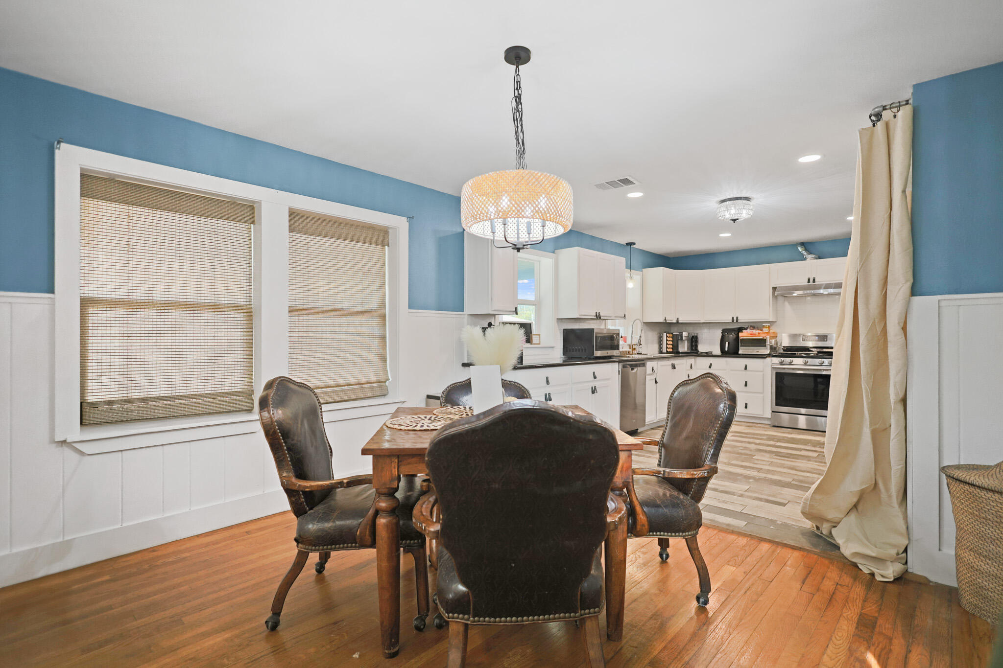 1904 28th Street Lubbock, TX 79411 - Photo 24 of 59 a view of a dining room with furniture and wooden floor