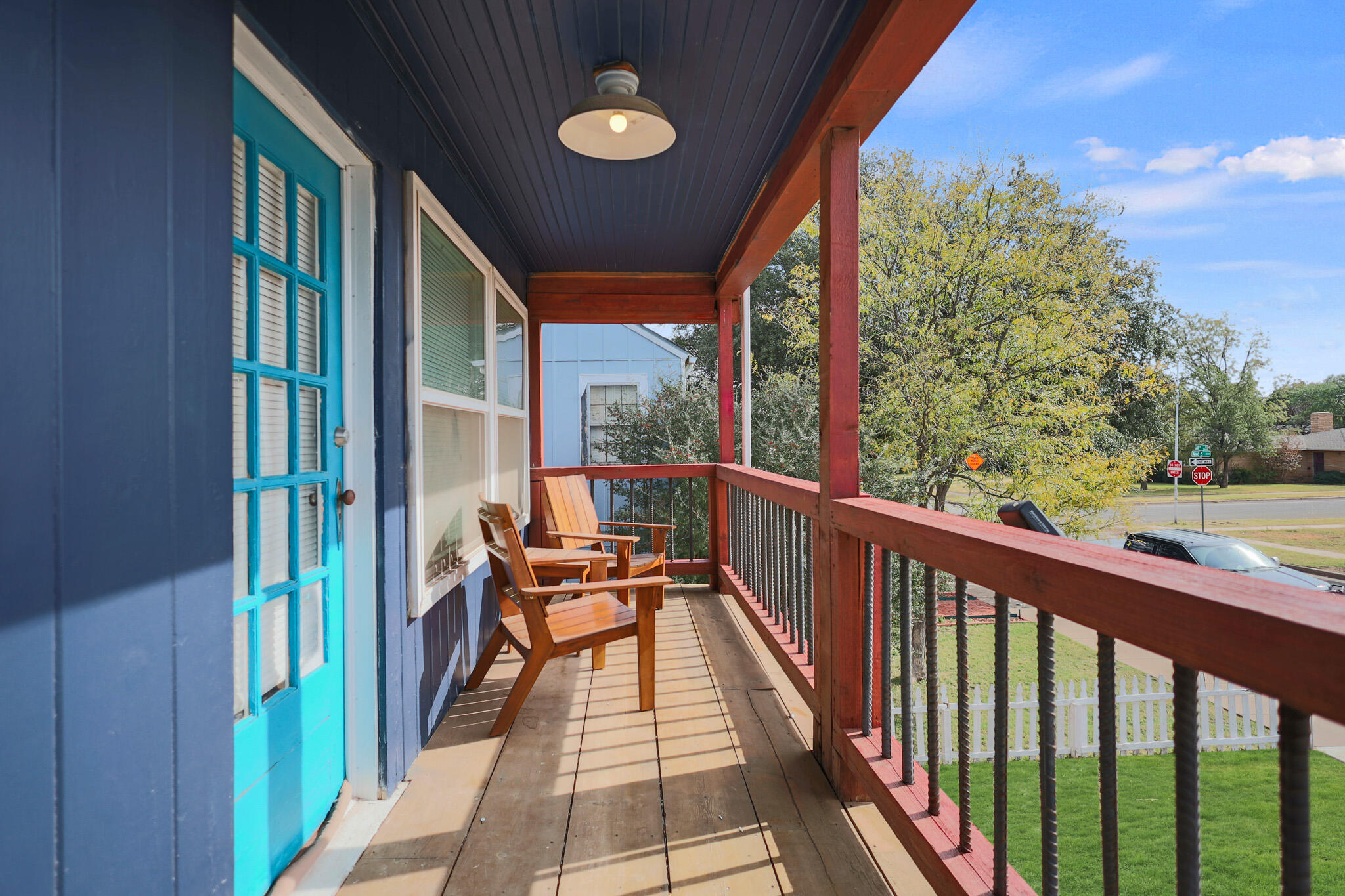 1904 28th Street Lubbock, TX 79411 - Photo 37 of 59 a view of a balcony with chairs and wooden floor