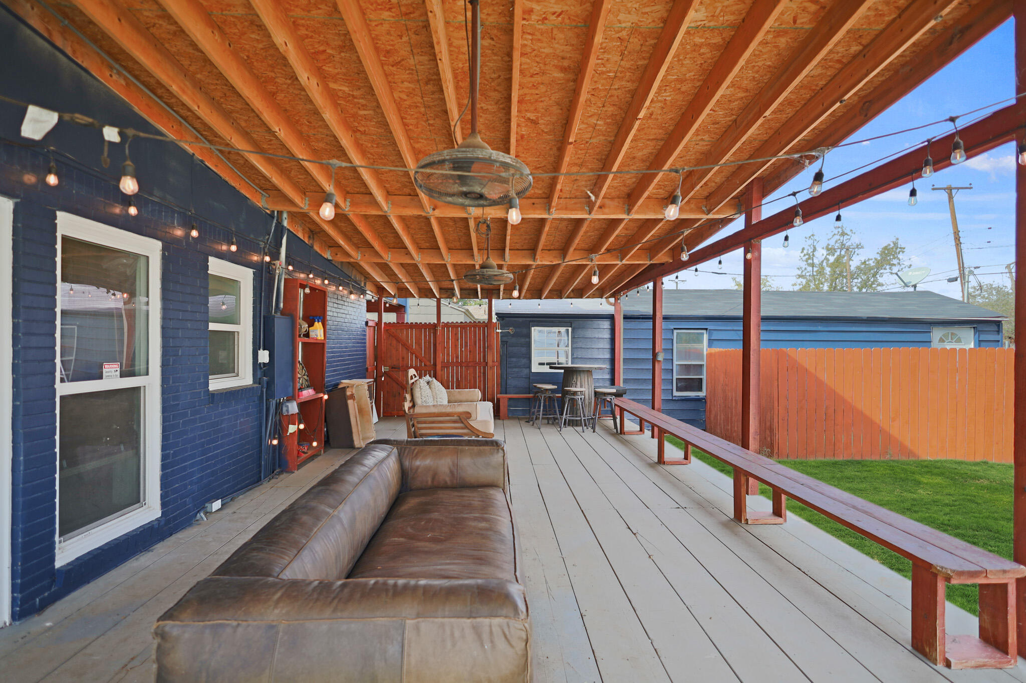 1904 28th Street Lubbock, TX 79411 - Photo 48 of 59 a view of a patio with a table chairs and a patio