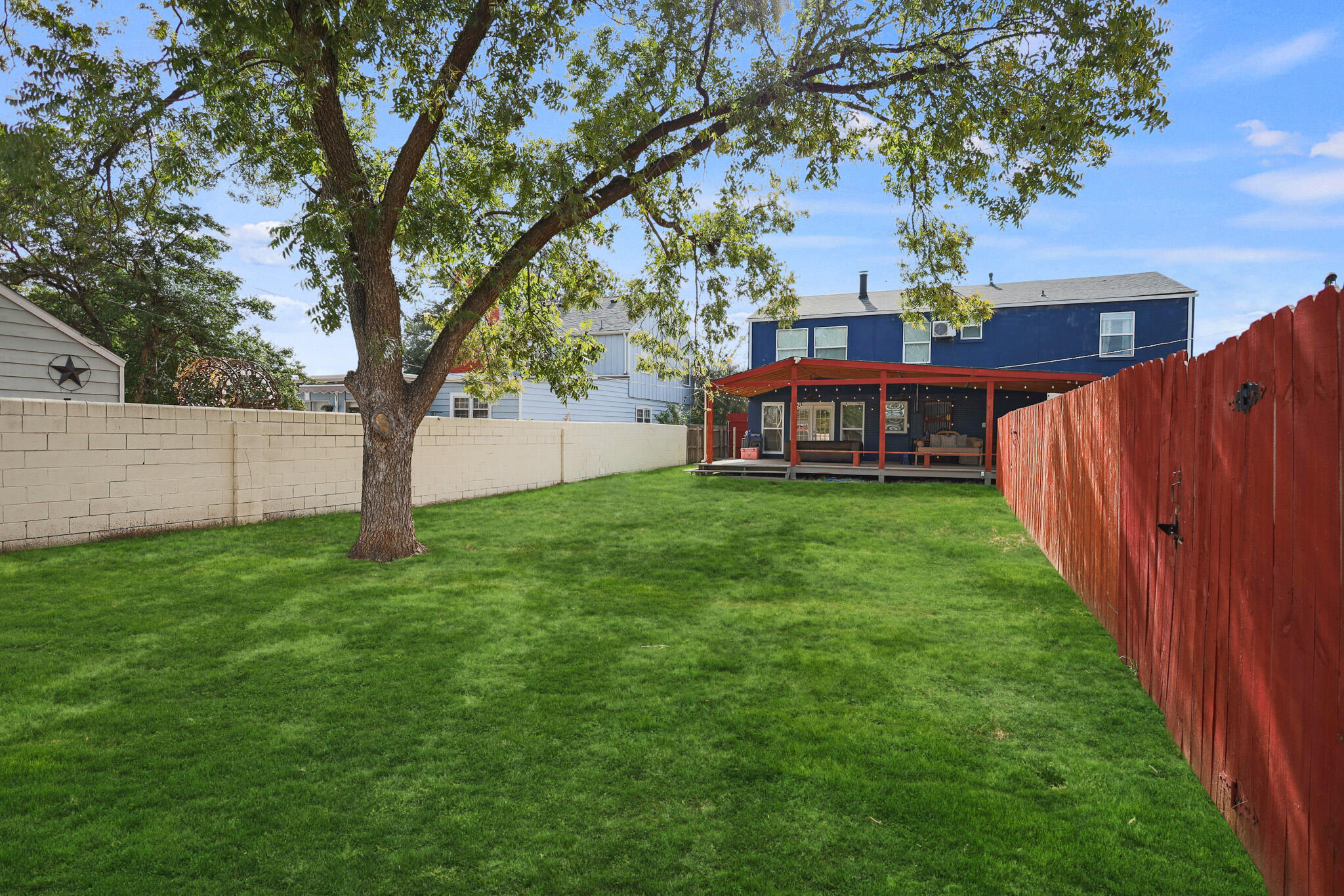 1904 28th Street Lubbock, TX 79411 - Photo 58 of 59 a view of a house with a yard
