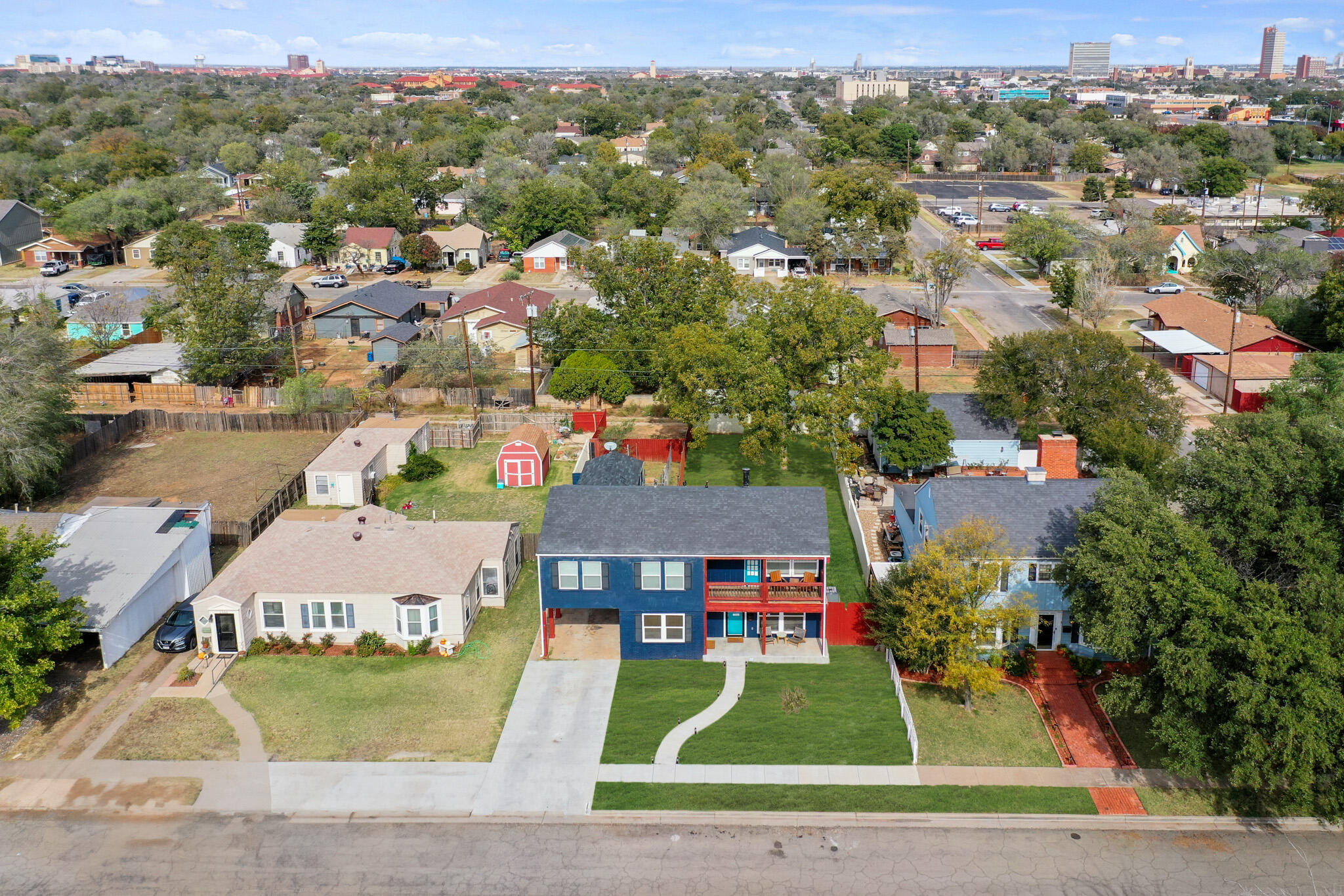 1904 28th Street Lubbock, TX 79411 - Photo 7 of 59 an aerial view of residential houses with outdoor space and parking