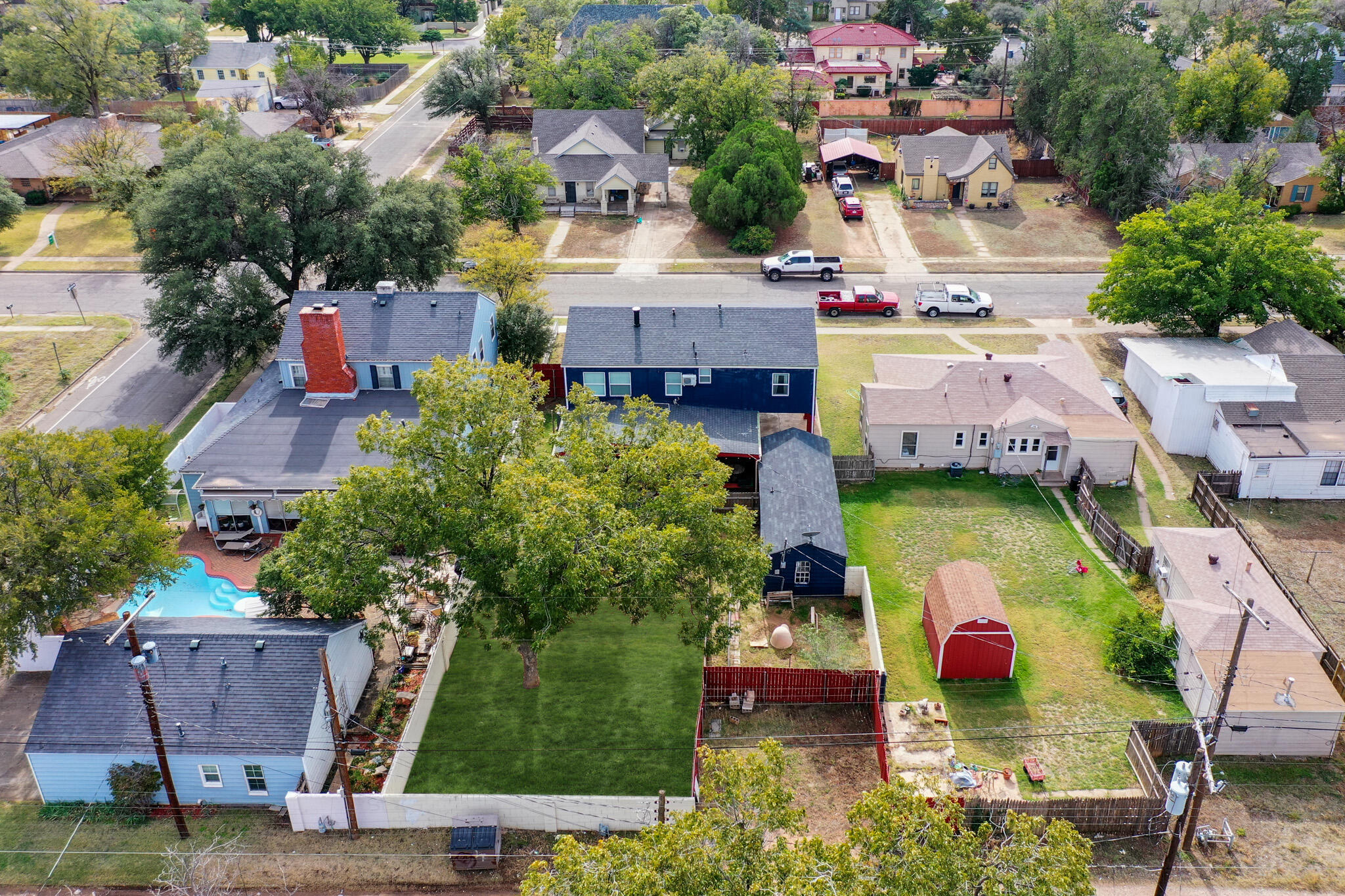 1904 28th Street Lubbock, TX 79411 - Photo 9 of 59 an aerial view of house with yard swimming pool and outdoor seating