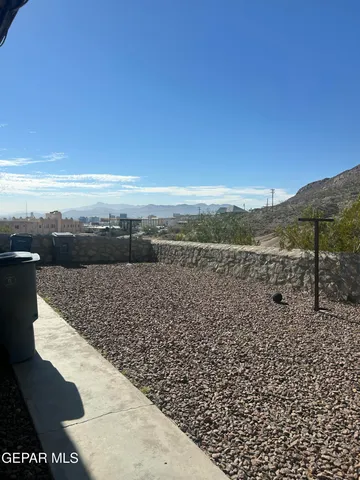 a view of outdoor space and mountain view in back
