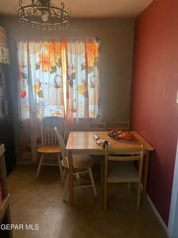 a table and chairs in a room