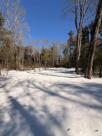 a view of a backyard of a house