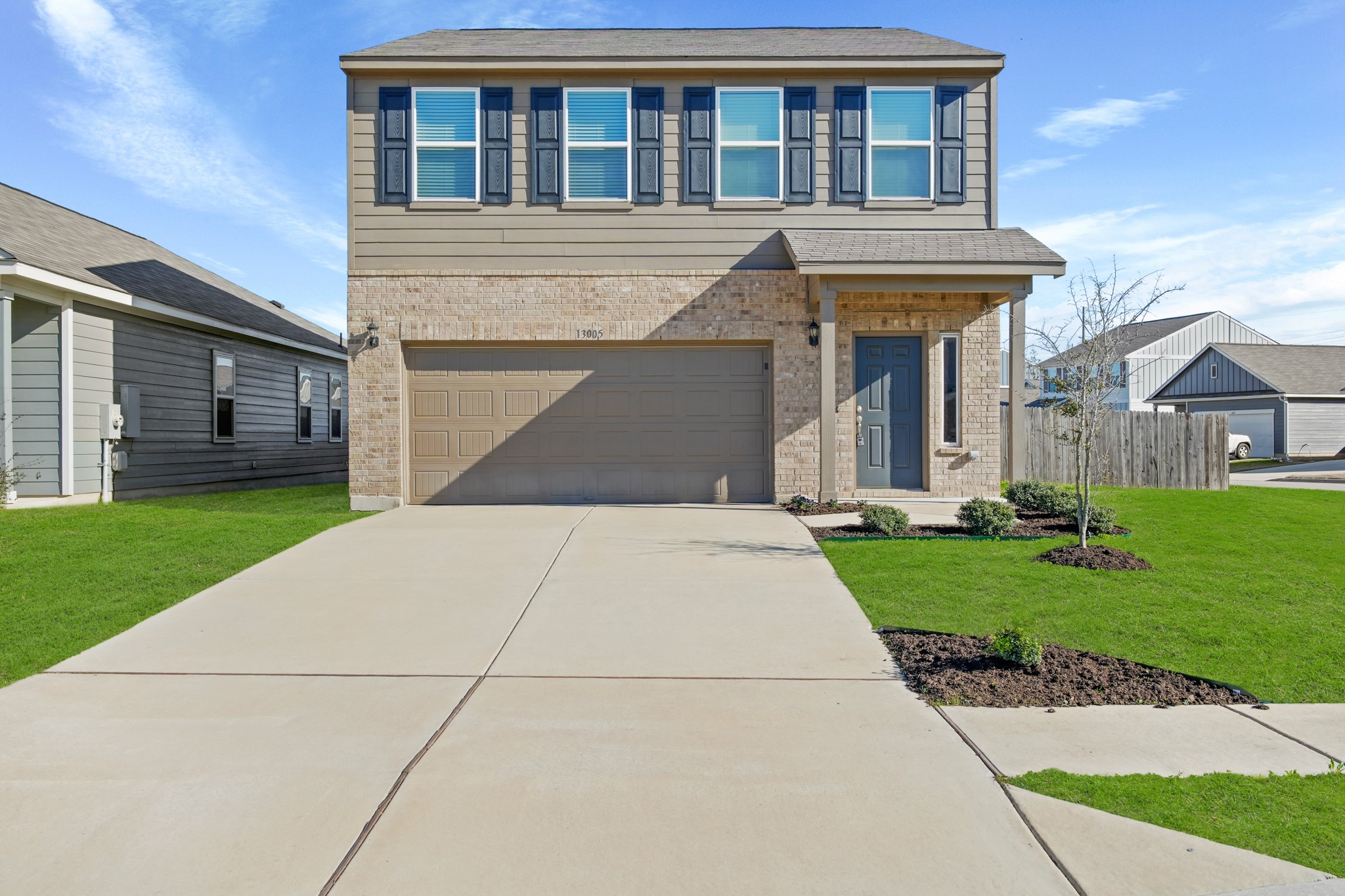 13005 Foreston Drive Austin, TX 78754 - Photo 2 of 36 front view of house with a yard