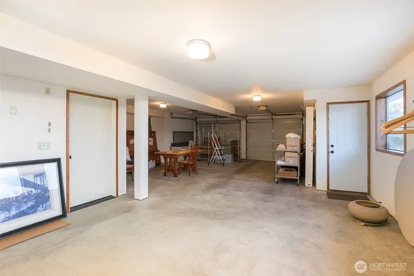 a view of work space with wooden floor and furniture