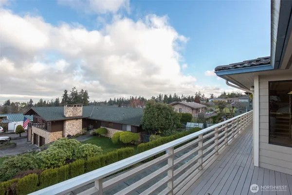 a view of a house with a yard and garage