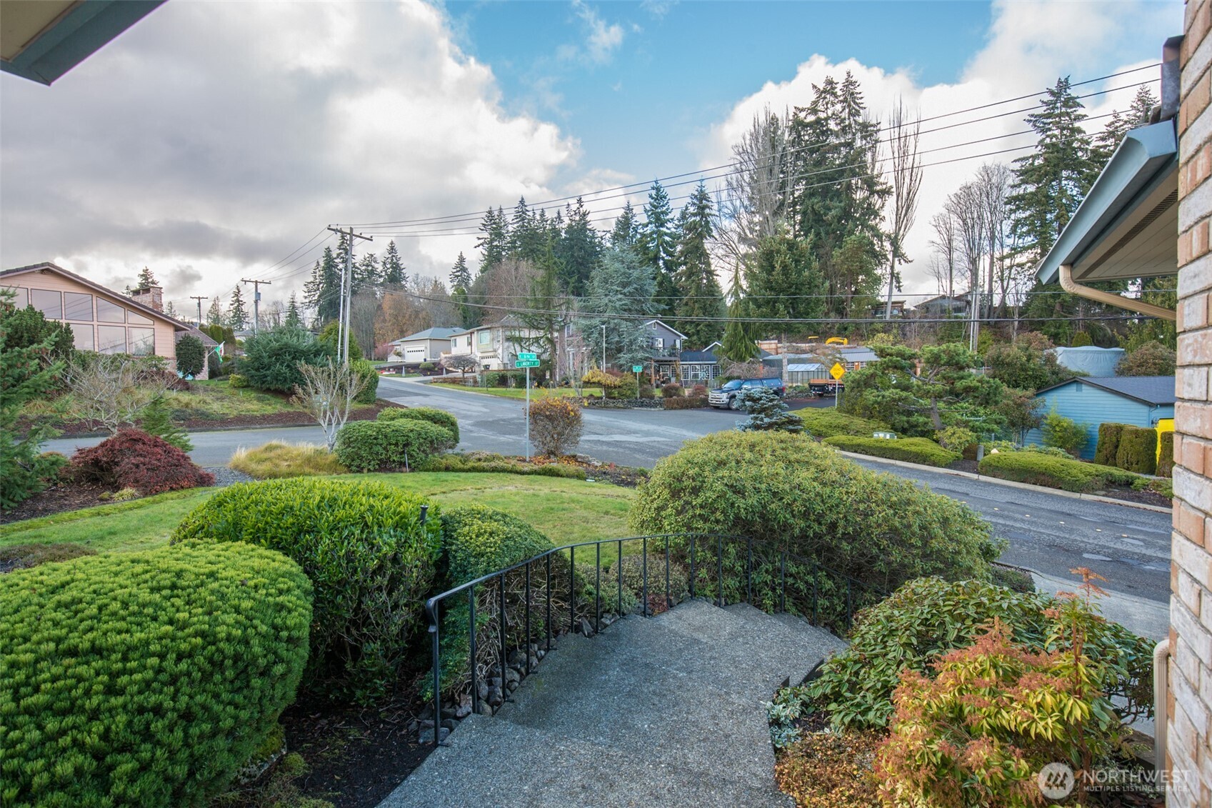 527 South Liberty Street Port Angeles, WA 98362 - Photo 40 of 40 a view of a garden with a building in the background