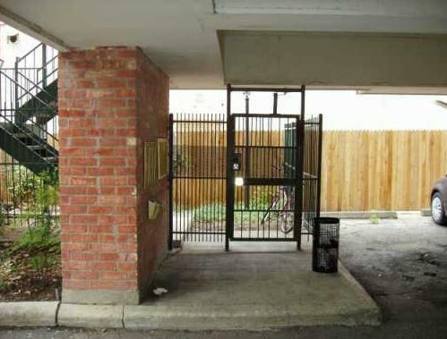 2811 Rio Grande Street, Unit 303 Austin, TX 78705 - Photo 11 of 11 a bedroom with a bed and a window