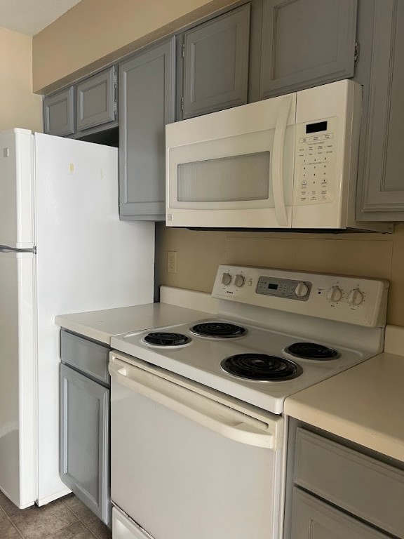 2811 Rio Grande Street, Unit 303 Austin, TX 78705 - Photo 4 of 11 a view of kitchen with washer and dryer