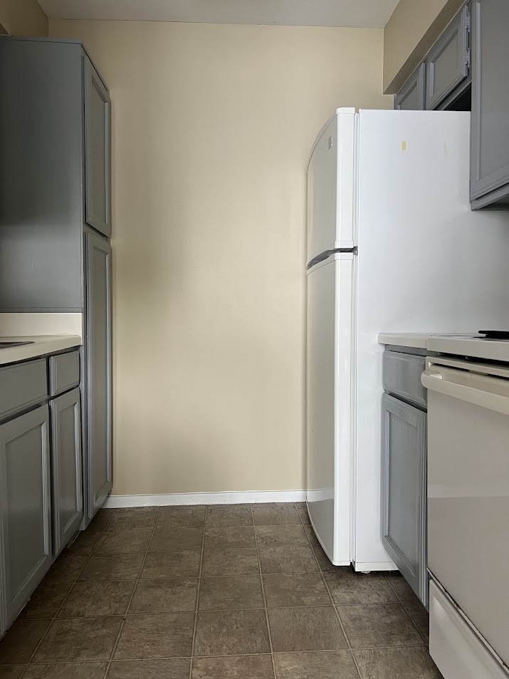 2811 Rio Grande Street, Unit 303 Austin, TX 78705 - Photo 6 of 11 a view of a storage & utility room with washer and dryer