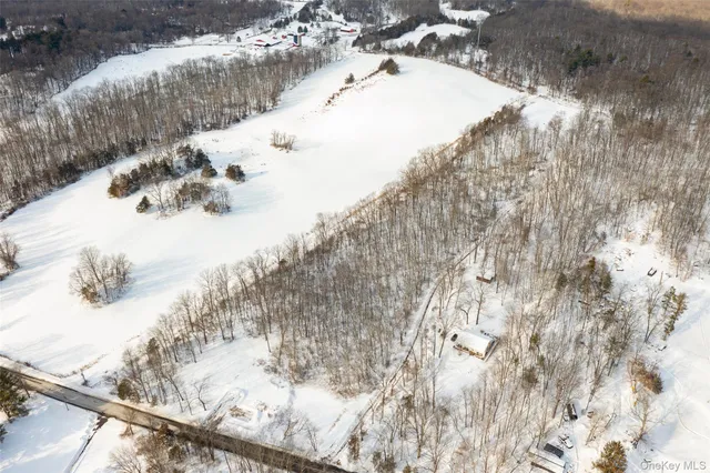 a view of lake with a city