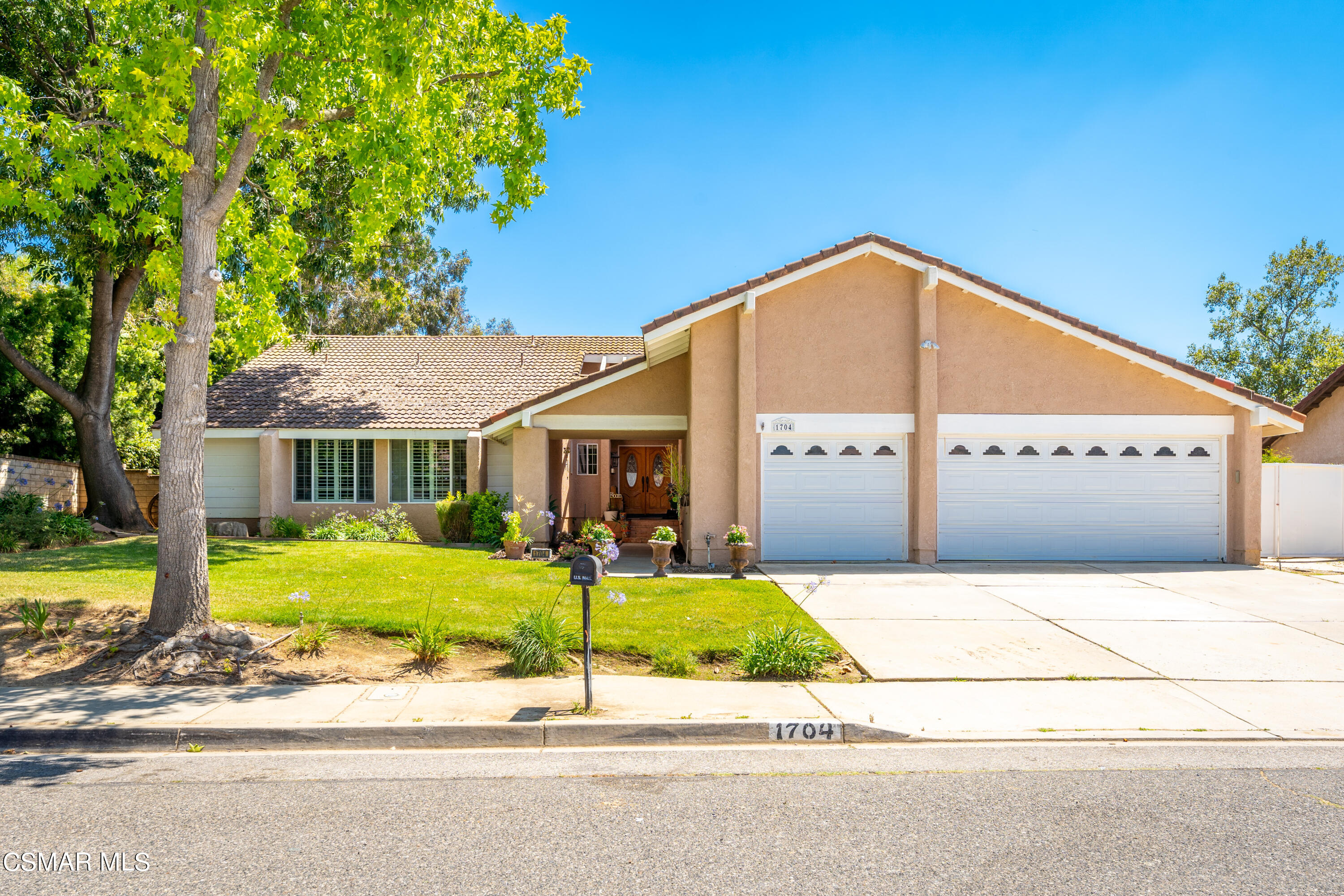1704 Rambling Road Simi Valley, CA 93065 - Photo 2 of 40 a view of a house with backyard and trees