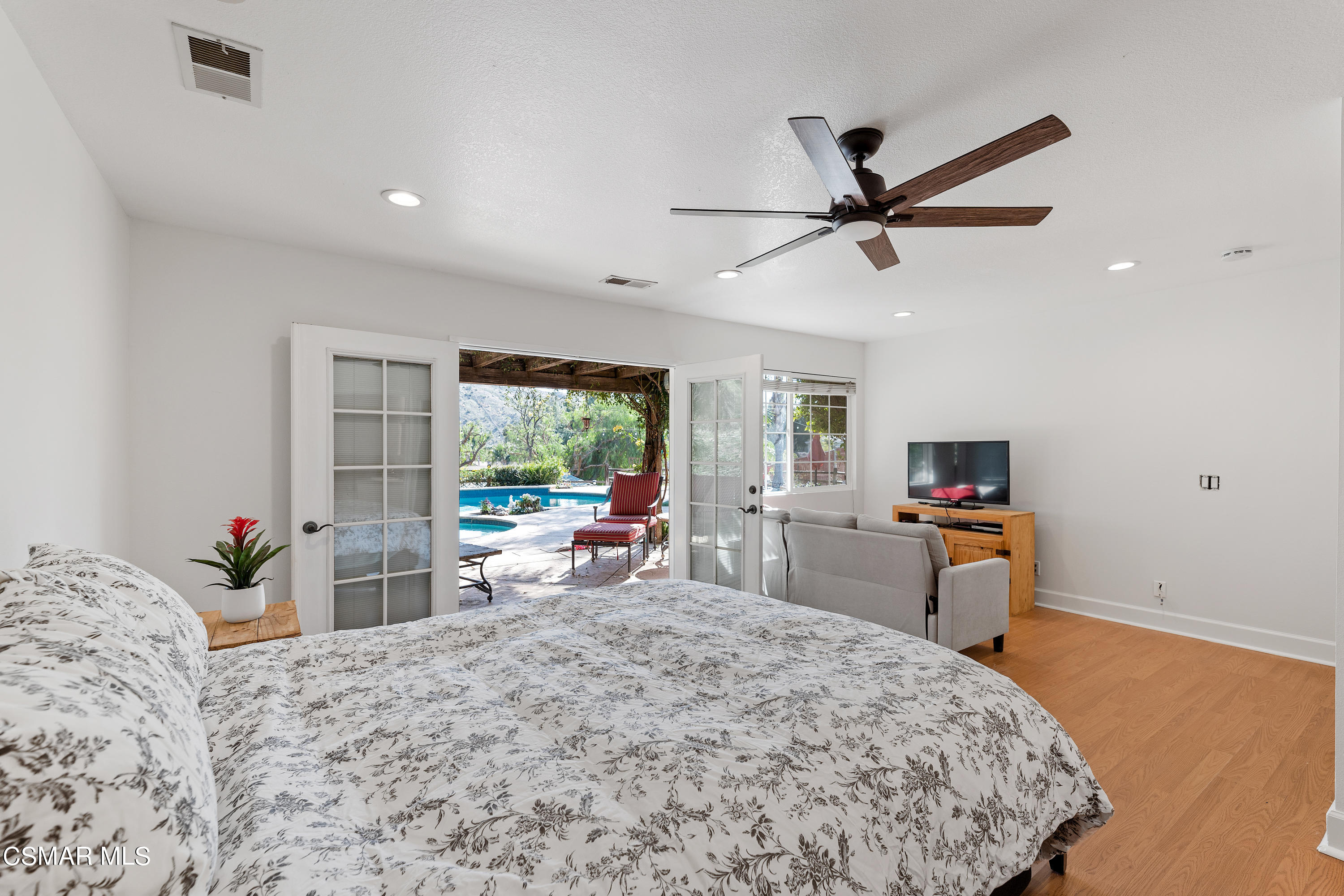 1704 Rambling Road Simi Valley, CA 93065 - Photo 13 of 40 a bedroom with furniture and a window
