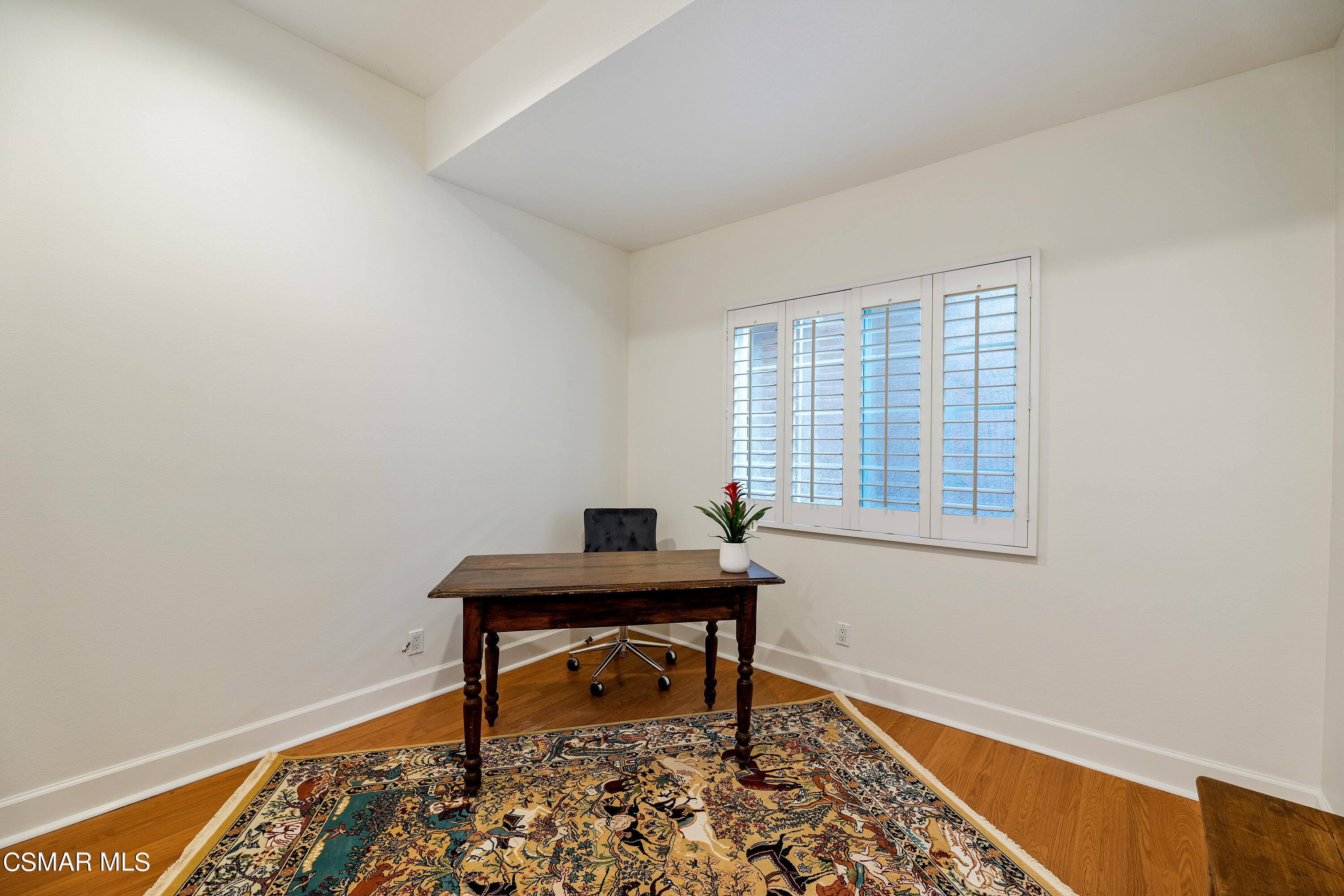 1704 Rambling Road Simi Valley, CA 93065 - Photo 19 of 40 a view of a workspace with furniture and a window