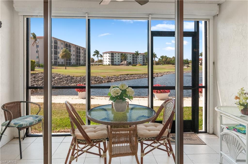 49 High Point Circle South, Unit 102 Naples, FL 34103 - Photo 2 of 42 Great view of the golf course, pond with water feature.