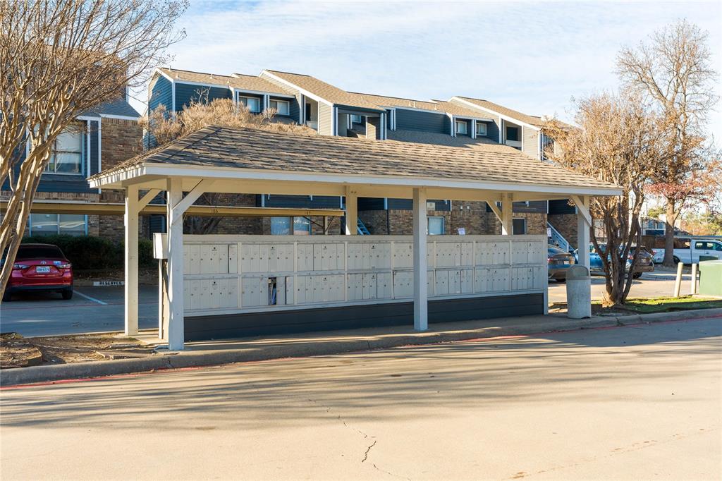 5840 Spring Valley Road, Unit 212 Dallas, TX 75254 - Photo 28 of 32 a house view with a outdoor space
