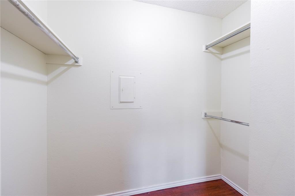 5840 Spring Valley Road, Unit 212 Dallas, TX 75254 - Photo 10 of 32 a view of small space with racks on the wall