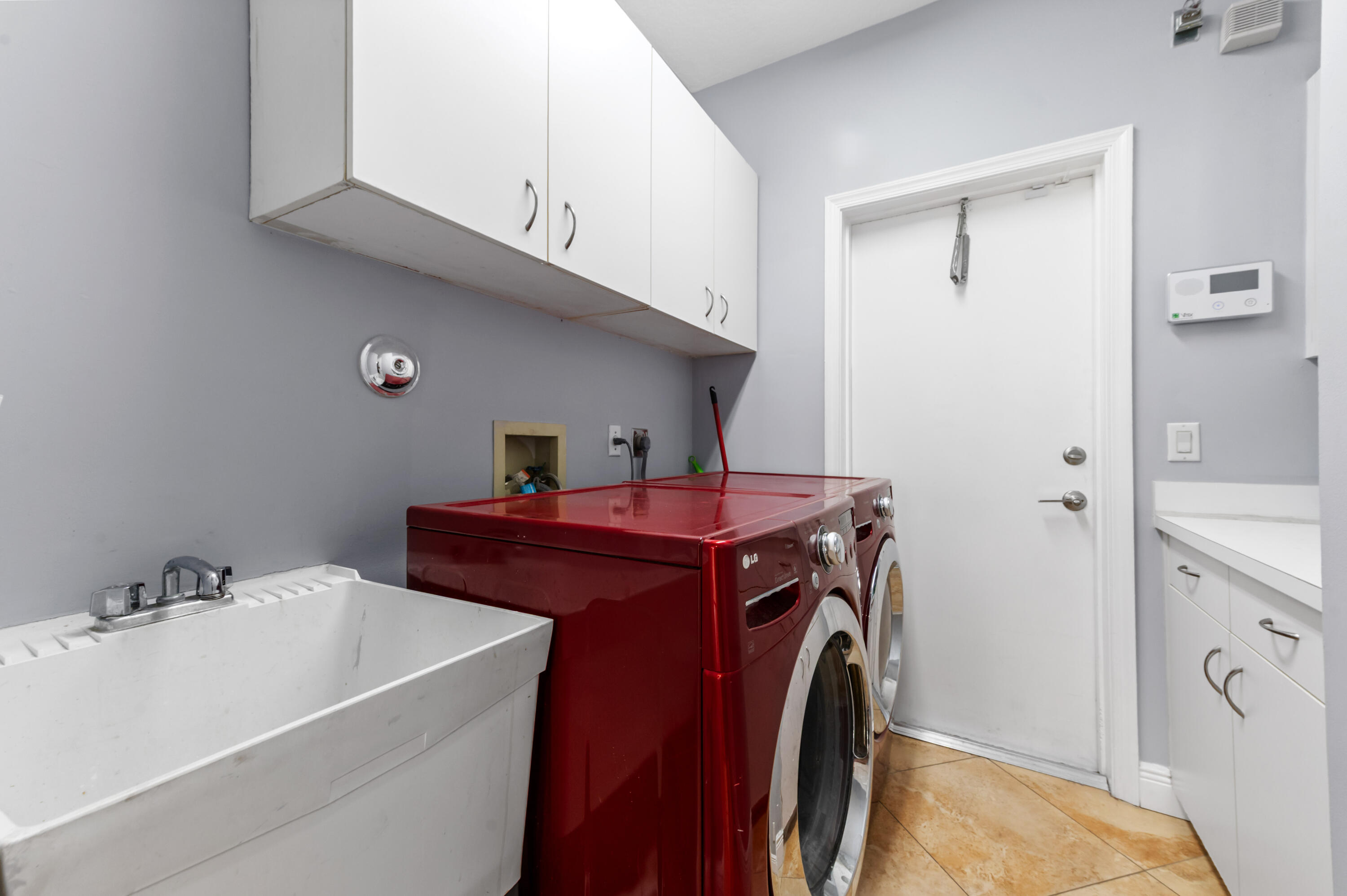22320 Holcomb Place Boca Raton, FL 33428 - Photo 29 of 43 21 laundry room 01