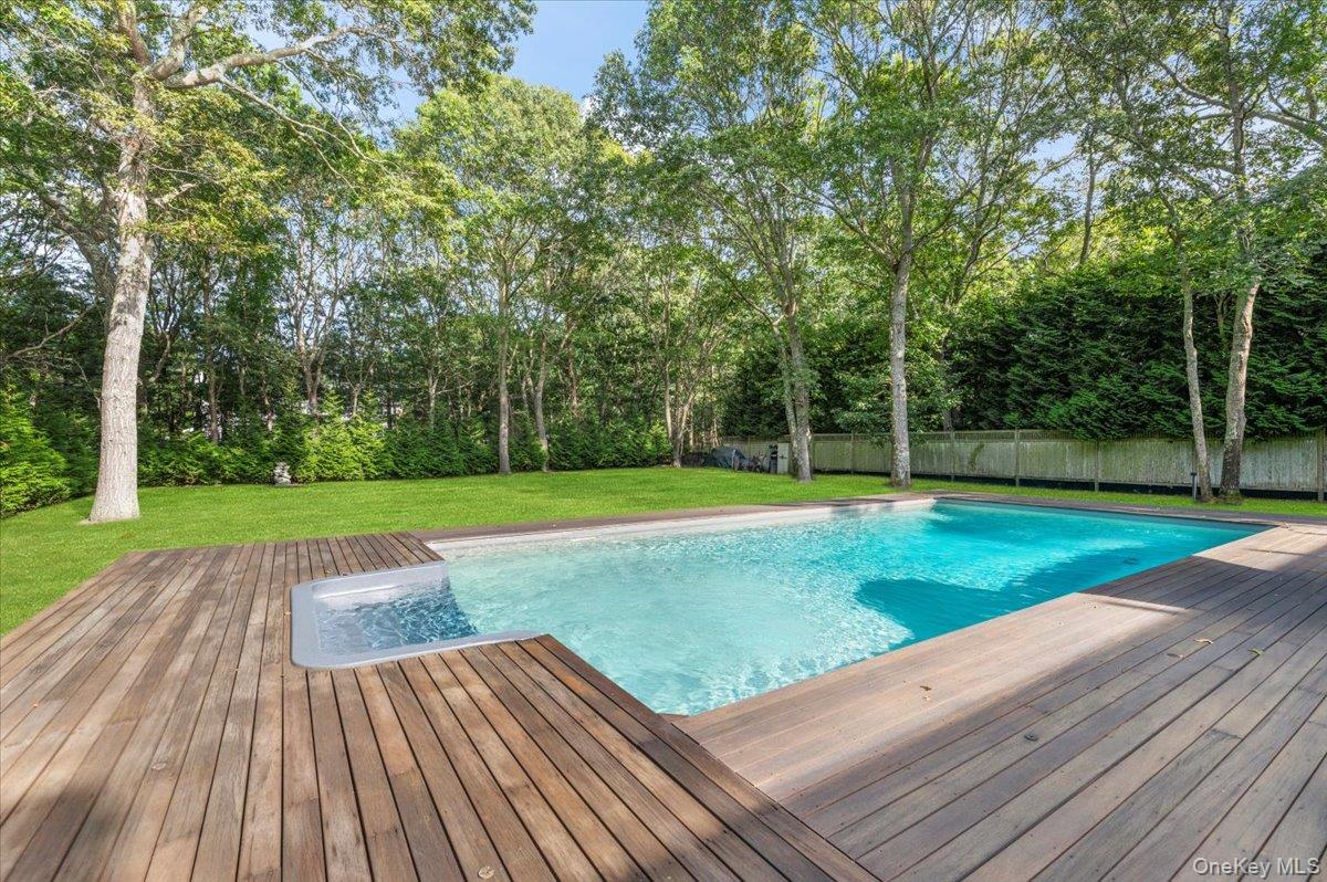 22 West Gate Road Wainscott, NY 11975 - Photo 39 of 42 a view of a park with large trees and a lots of trees