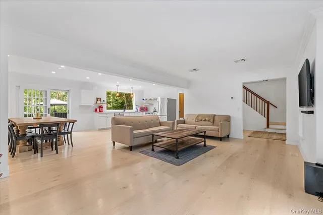 a living room with furniture and a table