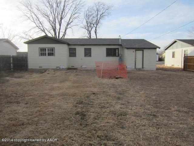 5107 Crockett Street Amarillo, TX 79110 - Photo 11 of 12 front view of a house with a dry yard