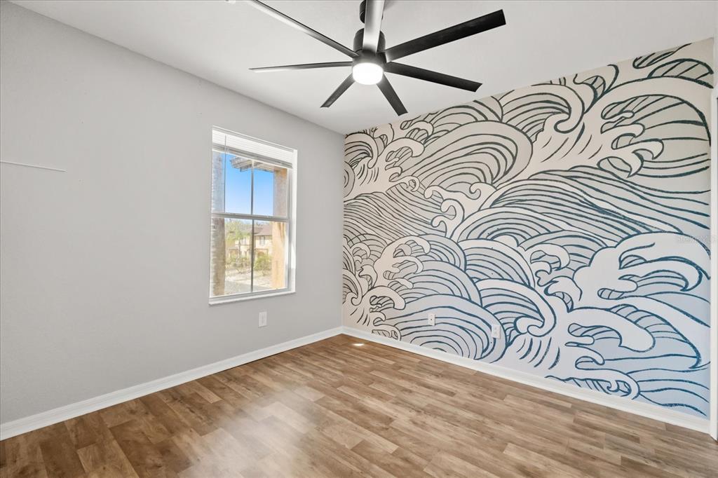 122 Capri Drive Davenport, FL 33897 - Photo 21 of 35 an empty room with windows